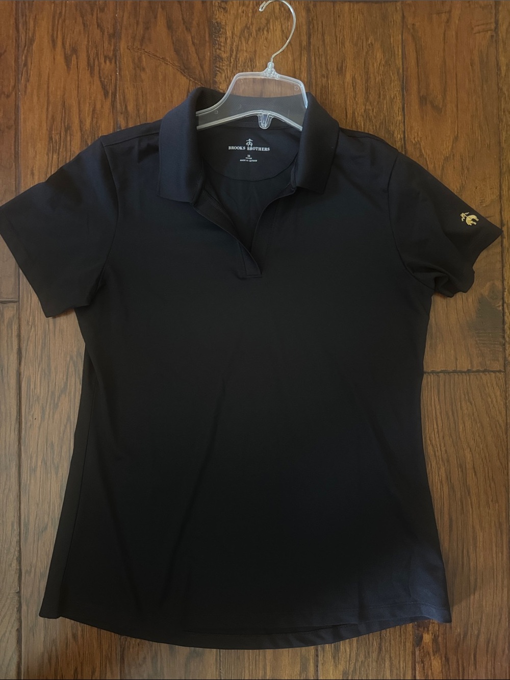 Brooks Brothers women’s black polo with Golden Fleece logo size medium